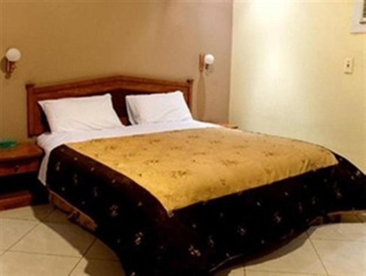 Bait Al Amani Suites Riade Quarto foto